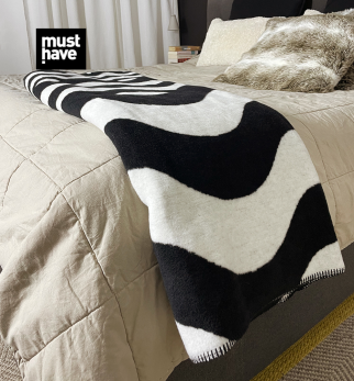 Koc Op-Art Sea Sunset projektu Maurycego Gomulickiego dla Hogai – nagrodzony Must Have na Łódź Design Festival.