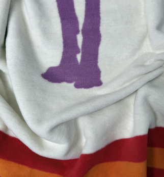 Bawełniany koc Lily Pixel z kolekcji Iggy – designerski pled HOGAI z motywem psa - detal